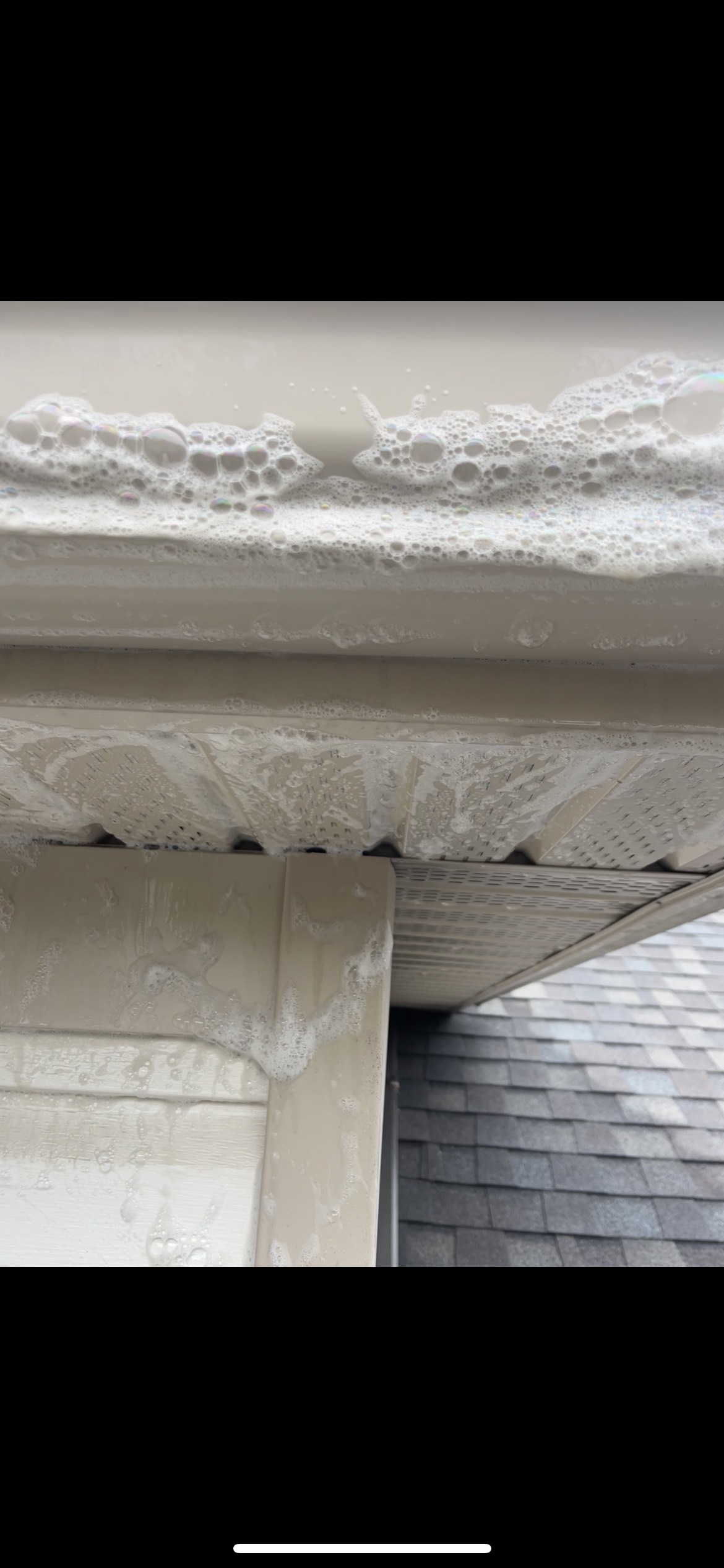 Cleaning foam on soffit and fascia during exterior whitening