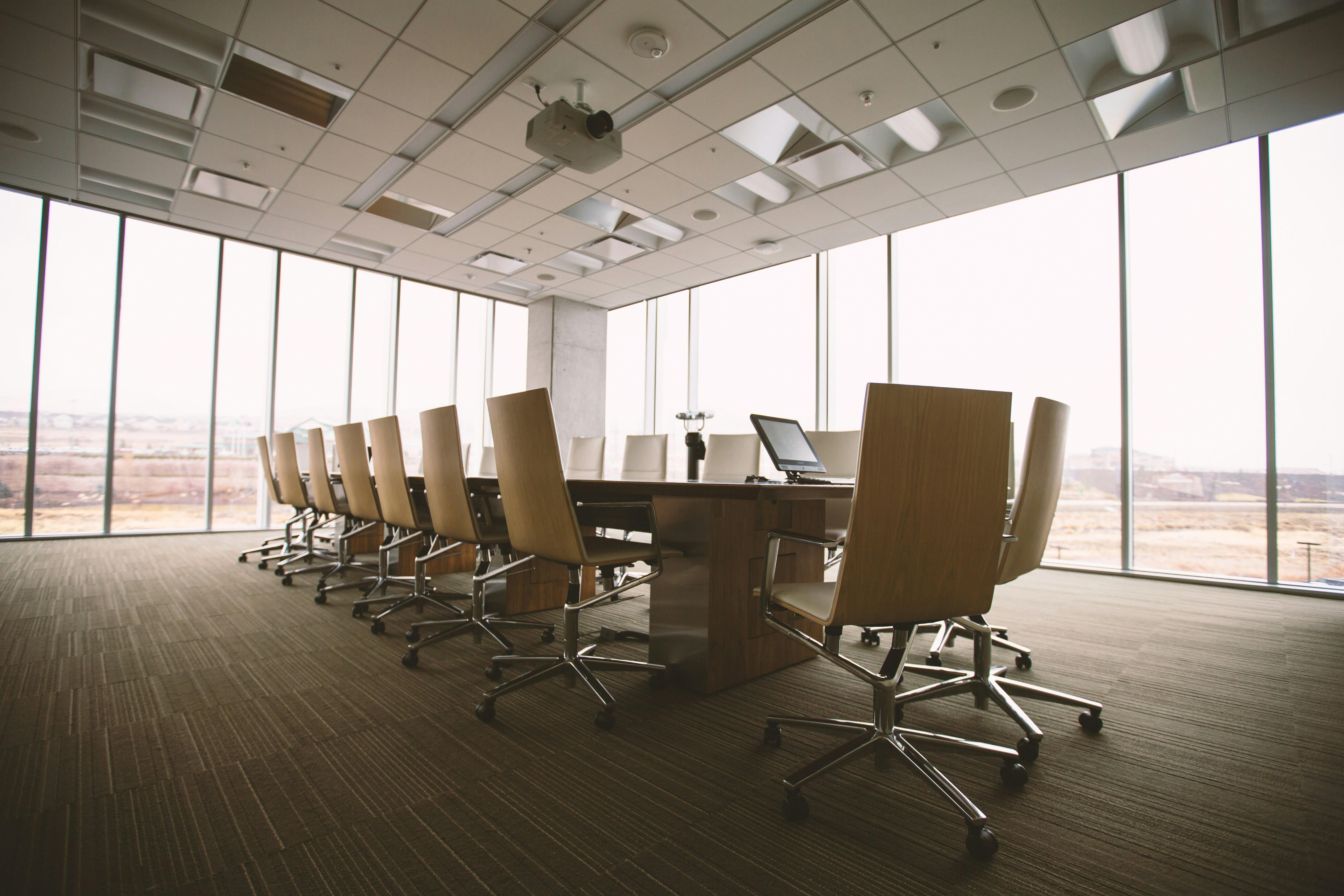 Modern office boardroom with floor-to-ceiling windows